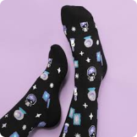 compression socks with crystal ball pattern in blues and purples on black.